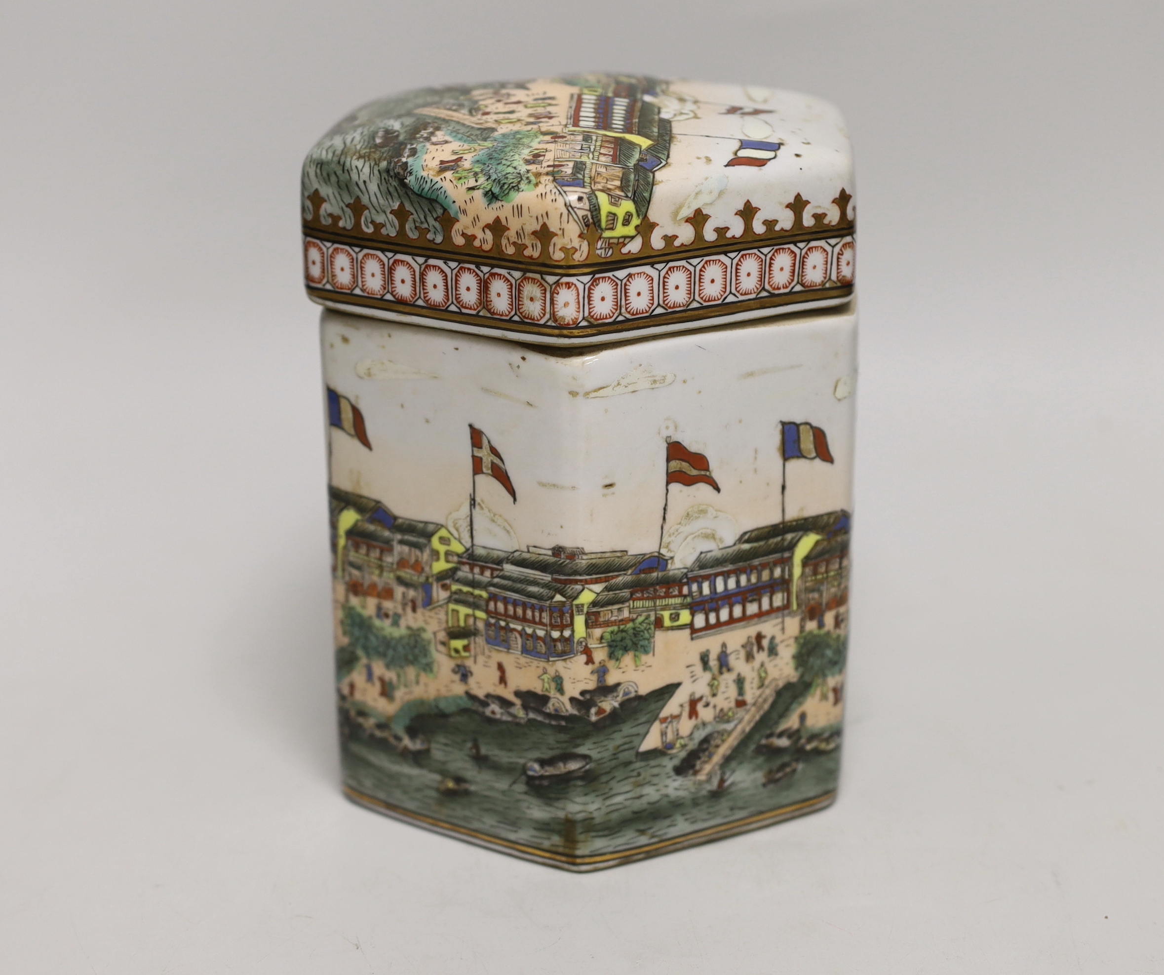 A Chinese hexagonal tea canister, decorated with the Hongs of Canton, 17cm